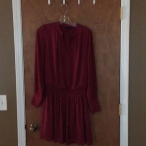Burgundy dress with layered skirt. One piece.